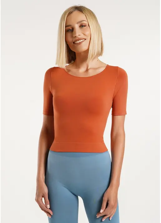 Укорочена безшовна футболка CROP T-SHIRT burnt sienna (помаранчевий)